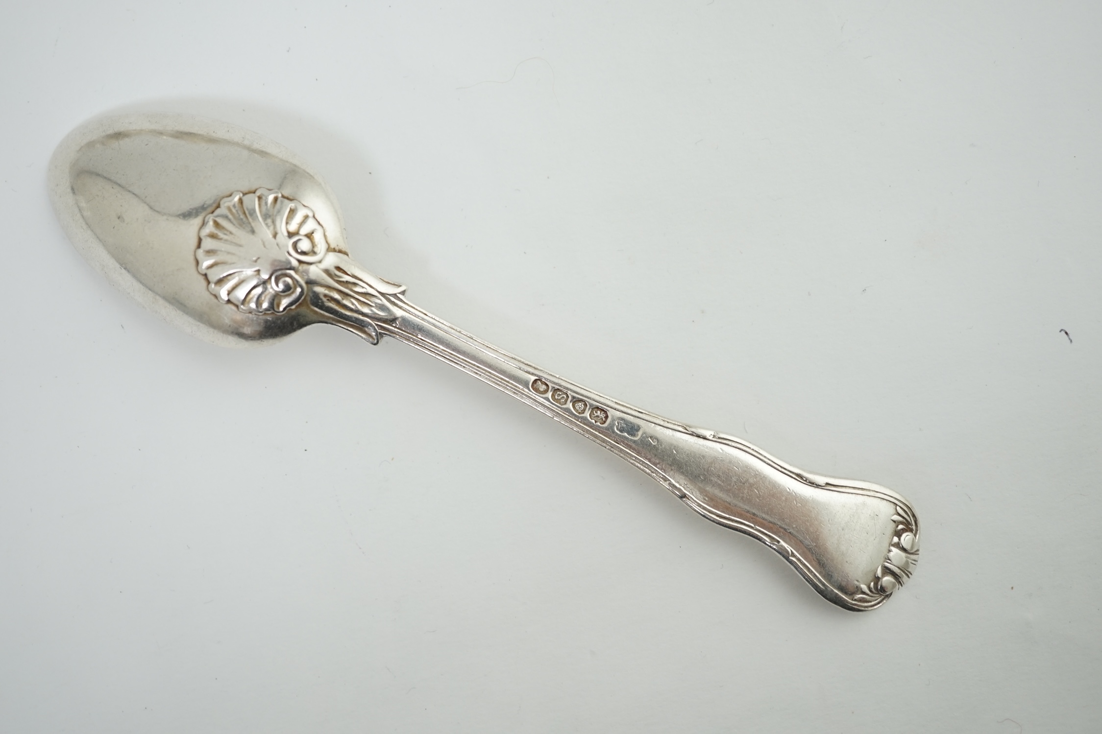 A harlequin set of twelve Georgian and Victorian silver Kings pattern dessert spoons, various dates and makers